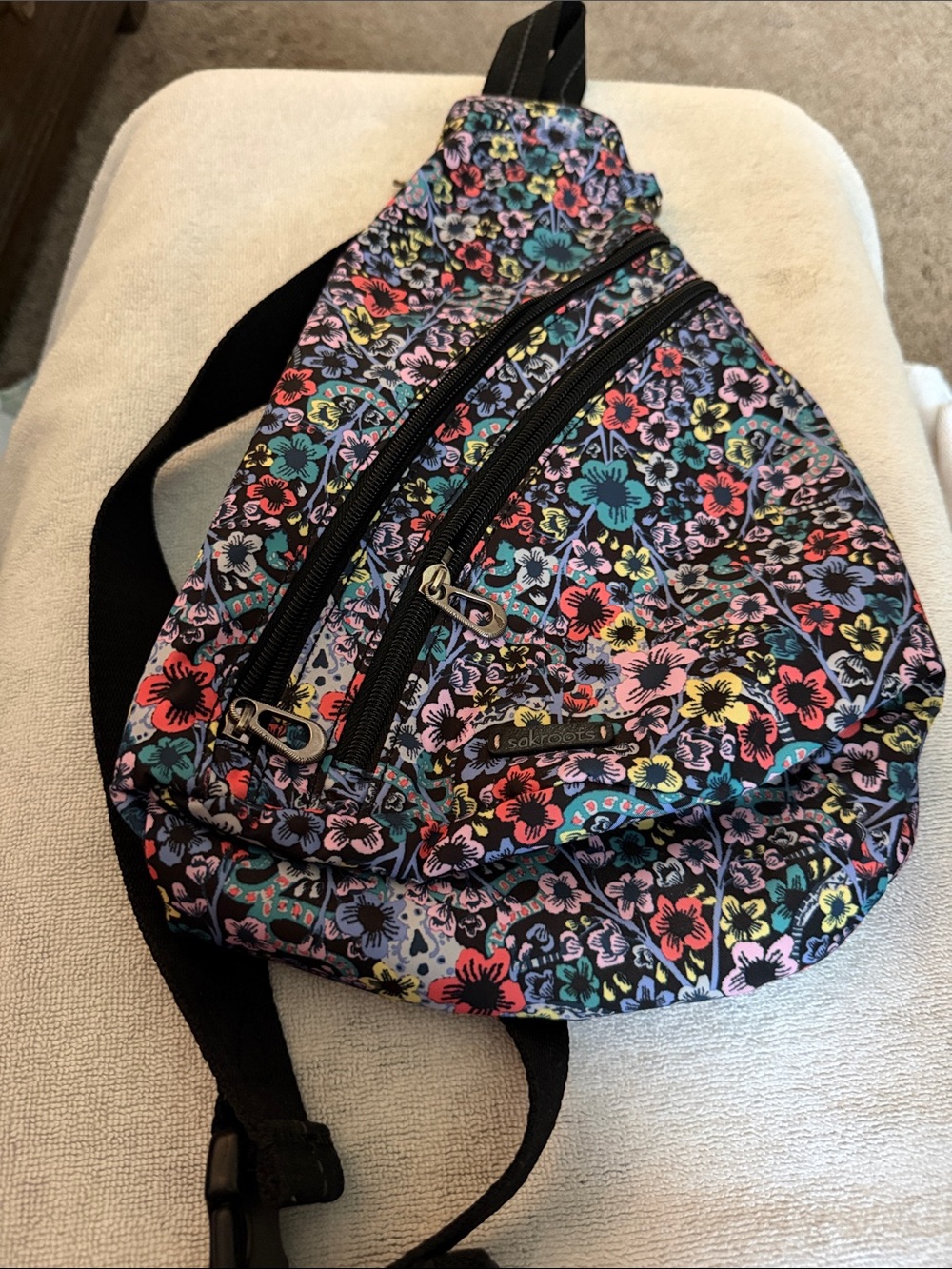 Sakroots Floral Print Crossbody Sling Bag in Black with Multicolor Flowers